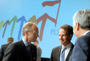 Luc Frieden en discussion avec Timothy Geithner à Wroclaw (c) Présidence polonaise de l'UE