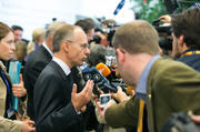Luc Frieden s'entretient avec la presse à Vilnius, le 13 septembre 2013, lors des réunions informelles de l'Eurogroupe et du Conseil Ecofin   source: eu2013.lt